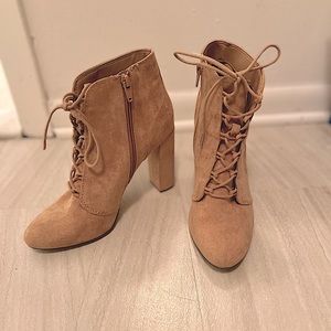 Tan laced up heels. Super comfy! Booties. Easy to pair.